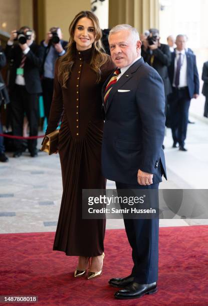 Queen Rania of Jordan and Abdullah II of Jordan attend the Coronation Reception For Overseas Guests at Buckingham Palace on May 05, 2023 in London,...