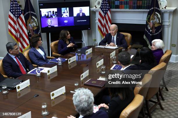 President Joe Biden speaks as Secretary of Health and Human Services Xavier Becerra, Secretary of Commerce Gina Raimondo, Vice President Kamala...