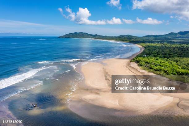 tamarindo beach and estuary, guanacaste, costa rica - costa rica bildbanksfoton och bilder