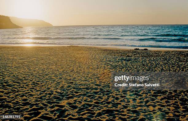isola d'elba, spiaggia di capoliveri all'imbrunire - imbrunire stockfoto's en -beelden