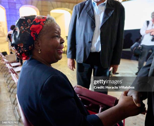 Mozambican author of novels and short stories in the Portuguese language Paulina Chiziane sits in front row before the ceremony in which she was...