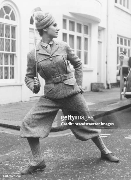 Model Sandra Miles wearing tweed golf fashion. London . 5 February 1969.