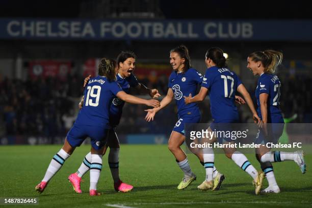 Sam Kerr of Chelsea celebrates with teammates after scoring her team's second goal during the FA Women's Super League match between Chelsea and...