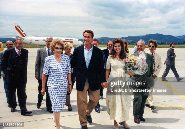 Arnold Schwarzenegger with his mother Aurelia and his wife Maria