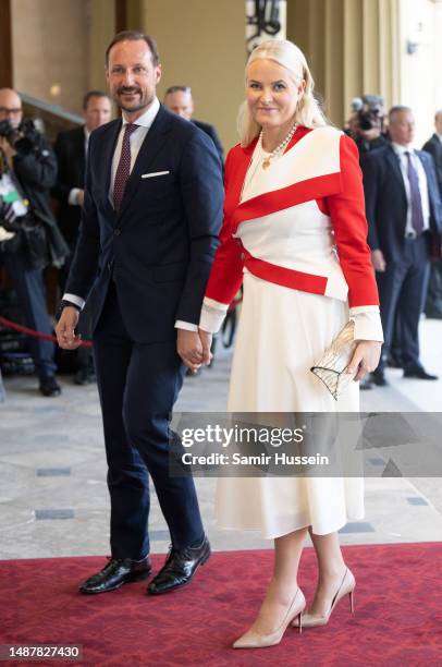 Haakon Crown Prince of Norway and Mette-Marit Crown Princess of Norway attend the Coronation Reception For Overseas Guests at Buckingham Palace on...