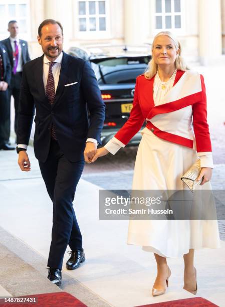 Haakon Crown Prince of Norway and Mette-Marit Crown Princess of Norway attend the Coronation Reception For Overseas Guests at Buckingham Palace on...