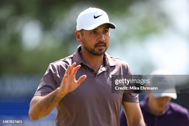 Jason Day of Australia waves on the ninth green during the second round of the Wells Fargo Championship at Quail Hollow Country Club on May 05, 2023...