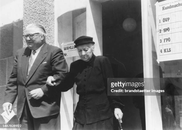 Austrian Vice Chancellor Bruno Pittermann leaving the polling station with his mother. National Council elections 1959. 10 May 1959.