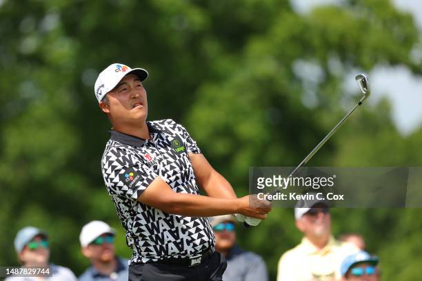 Kyoung-Hoon Lee of South Korea plays his shot from the 17th tee during the second round of the Wells Fargo Championship at Quail Hollow Country Club...