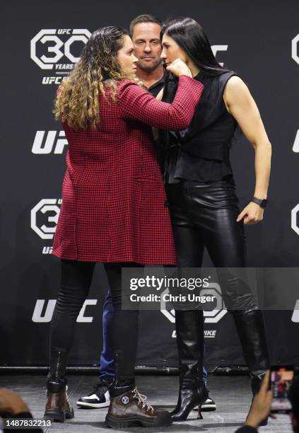 Opponents Amanda Nunes and Irene Aldana face off during the UFC 288 ceremonial weigh-in at Prudential Center on May 05, 2023 in Newark, New Jersey.