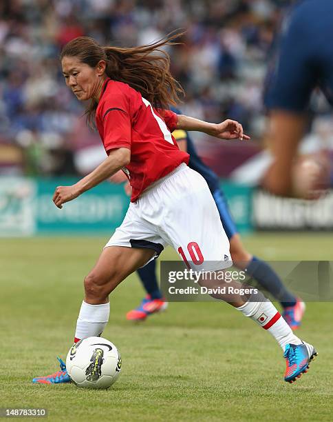 Homare Sawa of Japan runs with the ball during the friendly international match between Japan Women and France Women at Stade Charlety on July 19,...