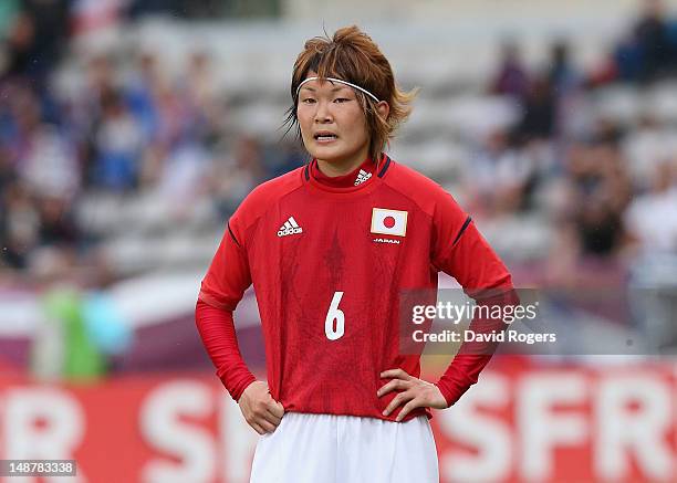 Mizuho Sakaguchi of Japan looks on during the friendly international match between Japan Women and France Women at Stade Charlety on July 19, 2012 in...