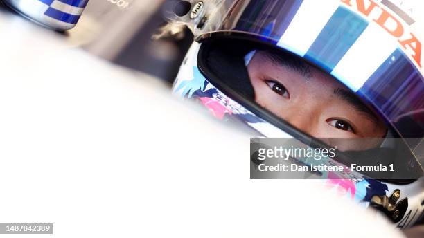 Yuki Tsunoda of Japan and Scuderia AlphaTauri prepares to drive in the garage during practice ahead of the F1 Grand Prix of Miami at Miami...