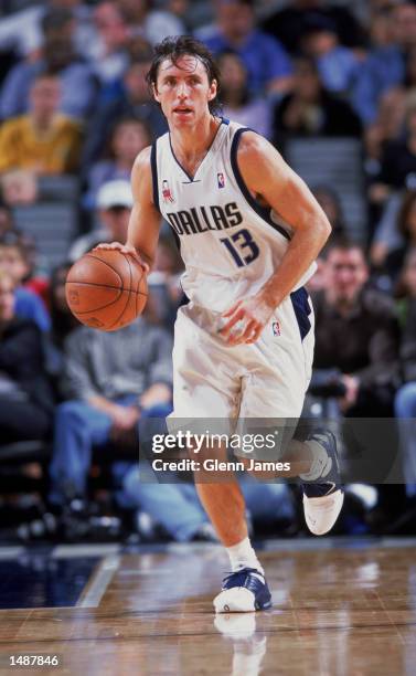 Point guard Steve Nash of the Dallas Mavericks dribbles the ball during the NBA game against the Los Angeles Clippers at the American Airlines Center...