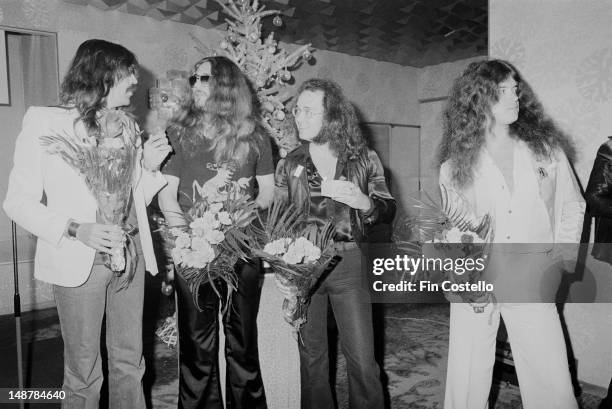 Keyboard player Jon Lord singer David Coverdale, drummer Ian Paice and bass player Glenn Hughes from English rock group Deep Purple posed at a...