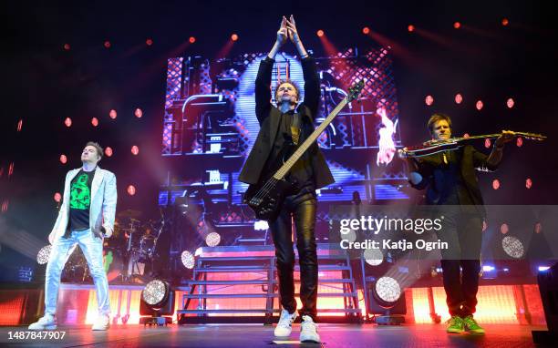 Simon Le Bon, John Taylor and Dominic Brown of Duran Duran perform on stage during the Future Past tour at Utilita Arena Birmingham on May 5, 2023 in...