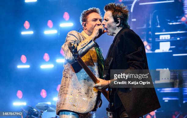 Simon Le Bon and John Taylor of Duran Duran perform on stage during the Future Past tour at Utilita Arena Birmingham on May 5, 2023 in Birmingham,...