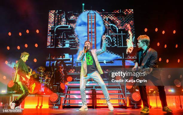 John Taylor, Simon Le Bon and Dominic Brown of Duran Duran perform on stage during the Future Past tour at Utilita Arena Birmingham on May 5, 2023 in...