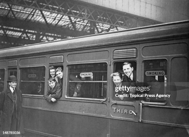 Group of orphaned boys from the Dr Barnardo's Homes leave Waterloo Station in London for a new life in Canada, April 1923.