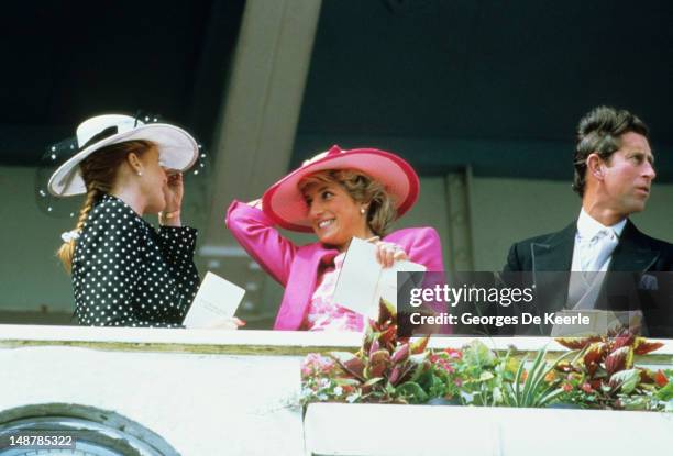 Sarah, Duchess of York, Diana, Princess of Wales and her husband Prince Charles watch the Epsom Derby March 6, 1987 in Epsom, United Kingdom.