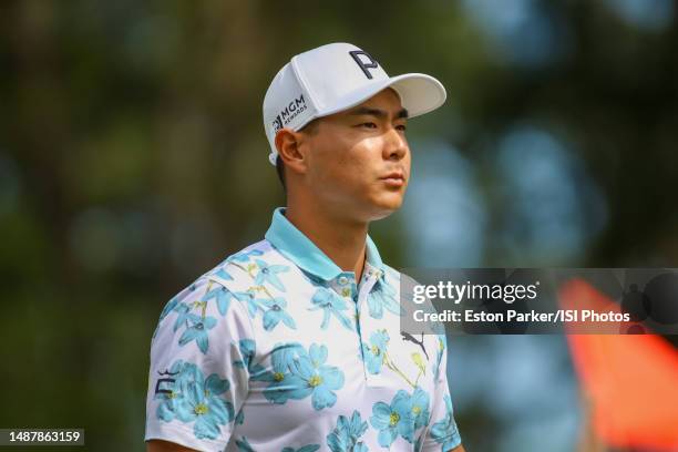 Justin Suh walks along the fairway of the fifth hole during round two of the Wells Fargo Championship at Quail Hollow Club on May 5, 2023 in...