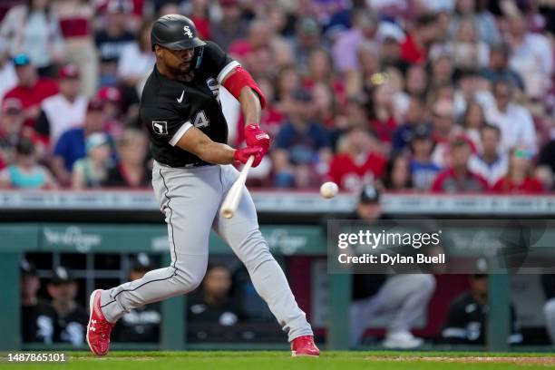 Eloy Jimenez of the Chicago White Sox hits a single in the sixth inning against the Cincinnati Reds at Great American Ball Park on May 05, 2023 in...