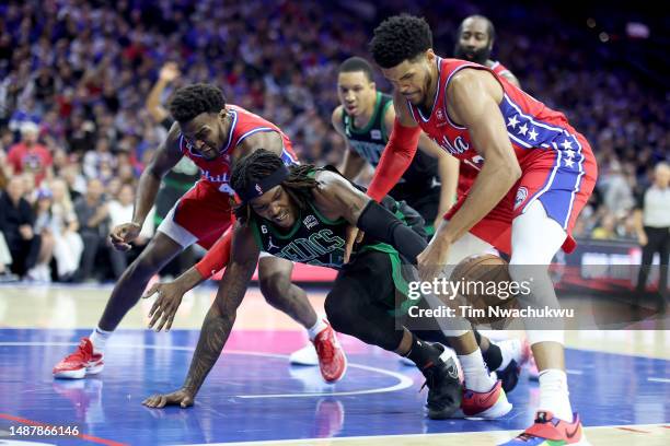 Robert Williams III of the Boston Celtics battles for the ball against Tobias Harris of the Philadelphia 76ers during the second quarter in game...