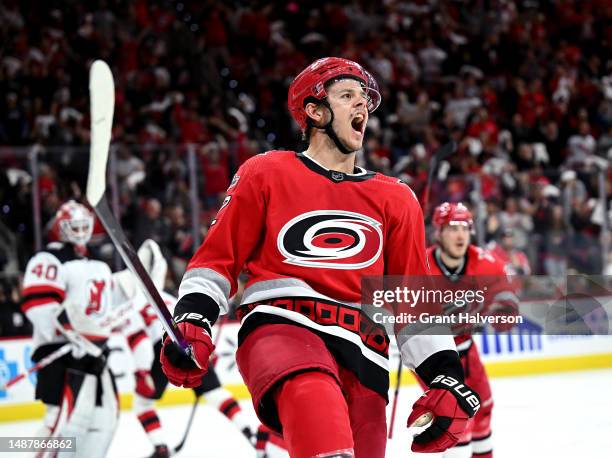 Jesperi Kotkaniemi of the Carolina Hurricanes reacts after scoring his second goal of the second period against the New Jersey Devils in Game Two of...