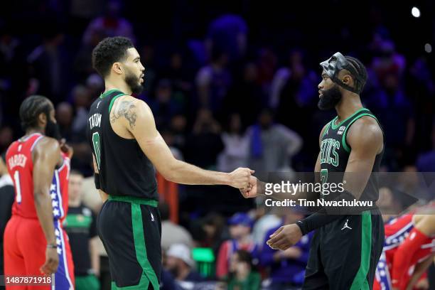 Jayson Tatum and Jaylen Brown of the Boston Celtics celebrate against the Philadelphia 76ers during the fourth quarter in game three of the Eastern...