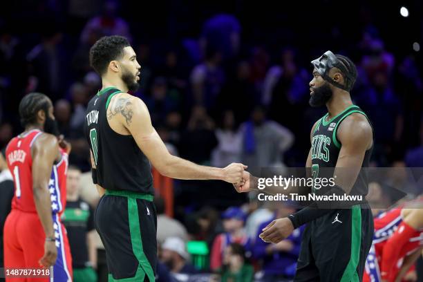 Jayson Tatum and Jaylen Brown of the Boston Celtics celebrate against the Philadelphia 76ers during the fourth quarter in game three of the Eastern...