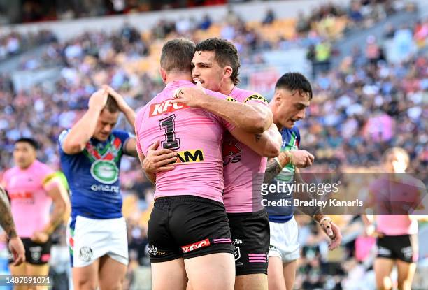 Dylan Edwards of the Panthers is congratulated by team mate Nathan Cleary of the Panthers after scoring a try during the round 10 NRL match between...