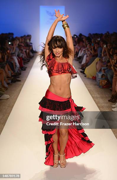 Karina Smirnoff walks the runway at the Lisa Blue show during Mercedes-Benz Fashion Week Swim 2013 at The Raleigh on July 19, 2013 in Miami Beach,...