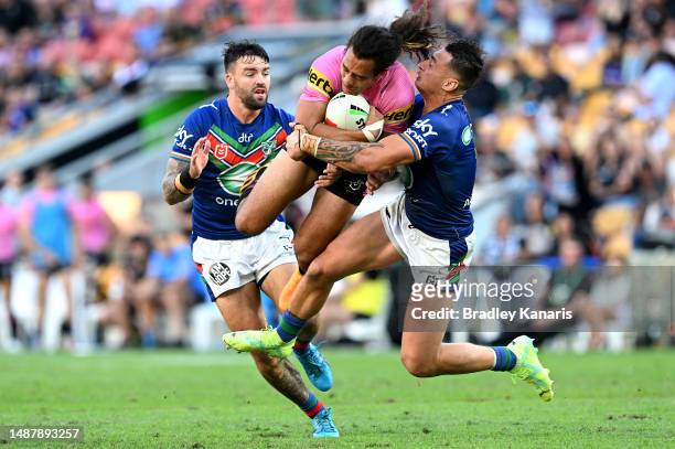 Jarome Luai of the Panthers jumps in the air as he is tackled during the round 10 NRL match between the New Zealand Warriors and Penrith Panthers at...