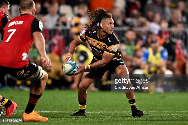 Issak Fines-Leleiwasa of the Force looks to pass the ball during the round 11 Super Rugby Pacific match between Crusaders and Western Force at...