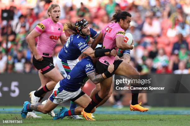 Jarome Luai of the Panthers is tackled during the round 10 NRL match between the New Zealand Warriors and Penrith Panthers at Suncorp Stadium on May...