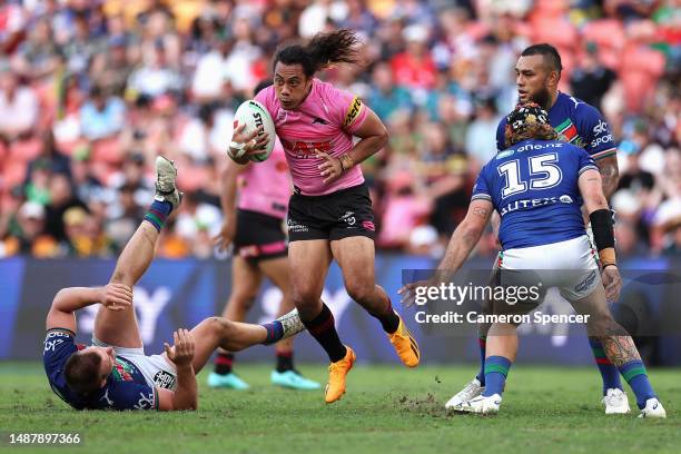 Jarome Luai of the Panthers is tackled during the round 10 NRL match between the New Zealand Warriors and Penrith Panthers at Suncorp Stadium on May...