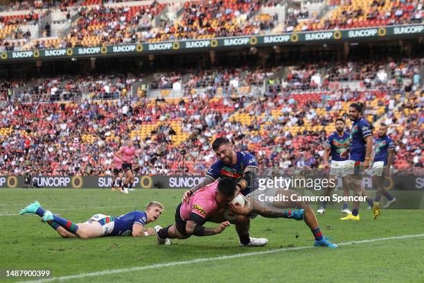 Spencer Leniu of the Panthers scores a try during the round 10 NRL match between the New Zealand Warriors and Penrith Panthers at Suncorp Stadium on...