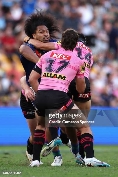 Bunty Afoa of the Warriors is tackled during the round 10 NRL match between the New Zealand Warriors and Penrith Panthers at Suncorp Stadium on May...