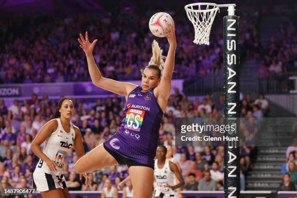 Donnell Wallam of the Firebirds controls the ball during the round eight Super Netball match between Queensland Firebirds and Collingwood Magpies at...