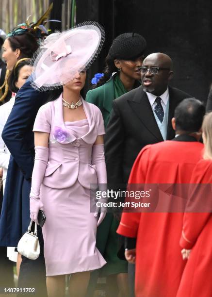 Katy Perry and Edward Enninful arrive at Westminster Abbey ahead of the Coronation of King Charles III and Queen Camilla on May 06, 2023 in London,...