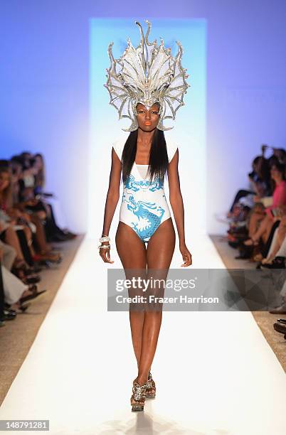 Model walks the runway at the Lisa Blue show during Mercedes-Benz Fashion Week Swim 2013 Official Coverage at The Raleigh on July 19, 2012 in Miami...