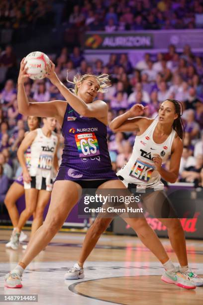 Donnell Wallam of the Firebirds controls the ball during the round eight Super Netball match between Queensland Firebirds and Collingwood Magpies at...