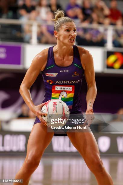 Kim Ravaillion of the Firebirds with the ball during the round eight Super Netball match between Queensland Firebirds and Collingwood Magpies at...