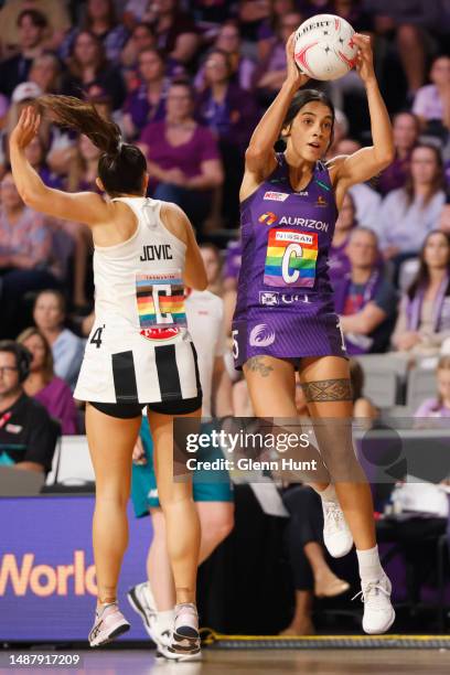 Hulita Veve of the Firebirds with the ball during the round eight Super Netball match between Queensland Firebirds and Collingwood Magpies at Nissan...