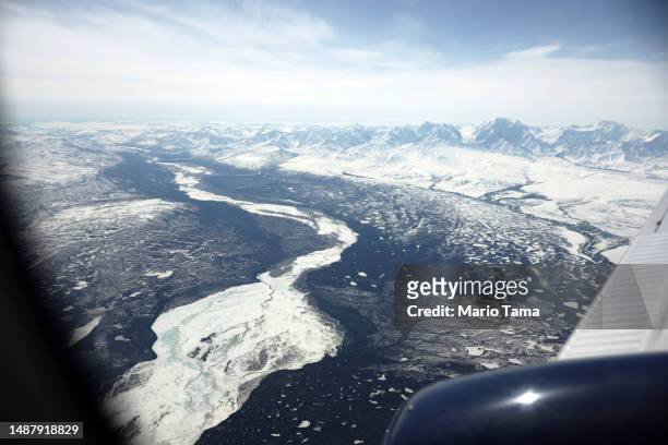 The Alaska Range is viewed from a NASA SnowEx campaign aircraft, which is studying changes in snow albedo in the Interior Alaska region during the...