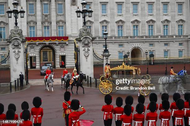 King Charles III and Camilla, Queen Consort travelling in the Diamond Jubilee Coach built in 2012 to commemorate the 60th anniversary of the reign of...