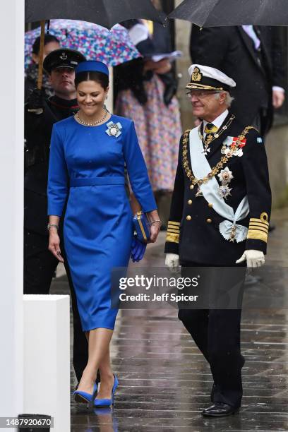 Victoria, Crown Princess of Sweden and Carl XVI Gustaf, King of Sweden attend the Coronation of King Charles III and Queen Camilla on May 06, 2023 in...