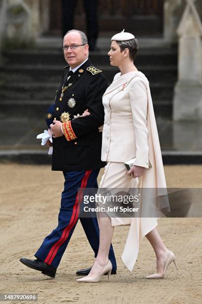 Albert II, Prince of Monaco and Charlene, Princess of Monaco attend the Coronation of King Charles III and Queen Camilla on May 06, 2023 in London,...