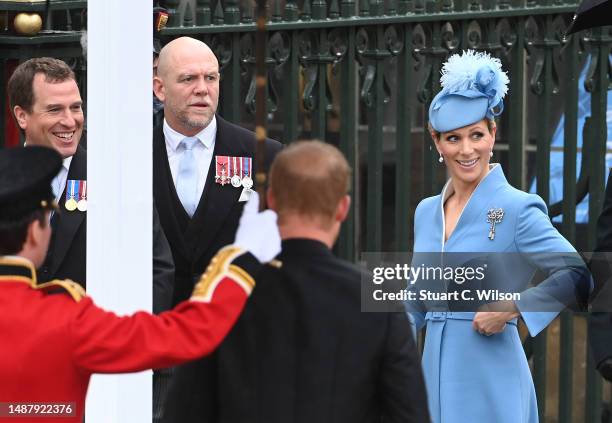 Peter Phillips, Mike Tindall and Zara Phillips arrive at the Coronation of King Charles III and Queen Camilla on May 06, 2023 in London, England. The...