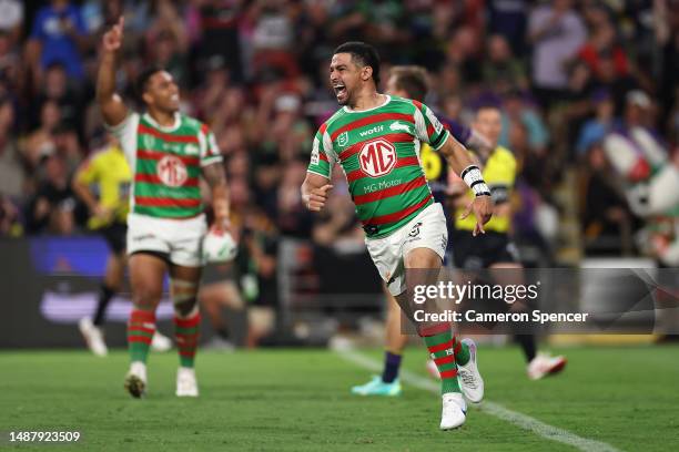 Cody Walker of the Rabbitohs celebrates scoring a try with team mates during the round 10 NRL match between Melbourne Storm and South Sydney...